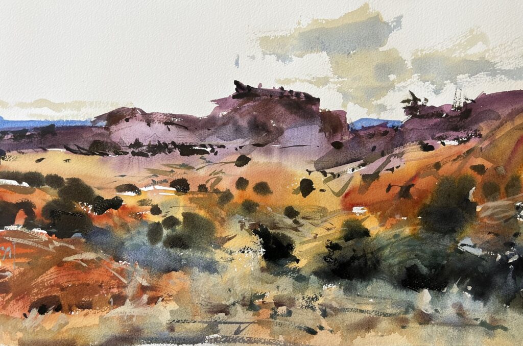 Watercolor painting of a desert landscape with purple hills and orange foreground
